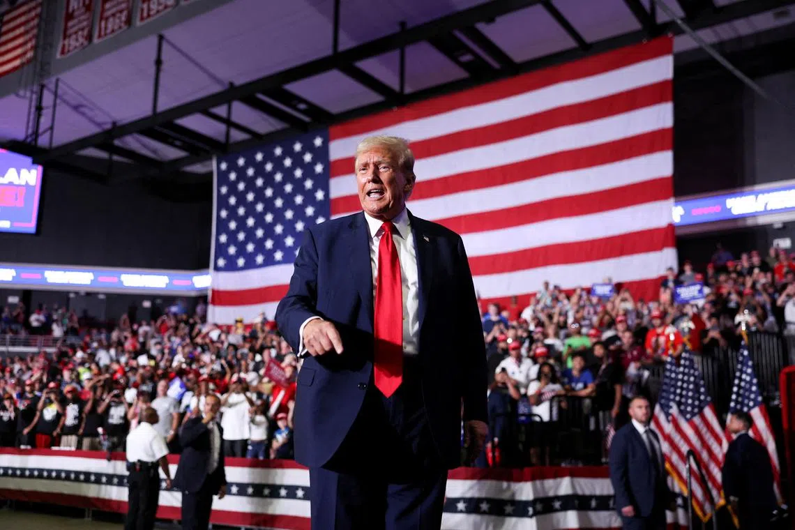 FILE PHOTO: Former U.S. President and Republican presidential candidate Donald Trump attends a campaign event in Philadelphia, Pennsylvania, U.S., June 22, 2024. REUTERS/Tom Brenner/File Photo