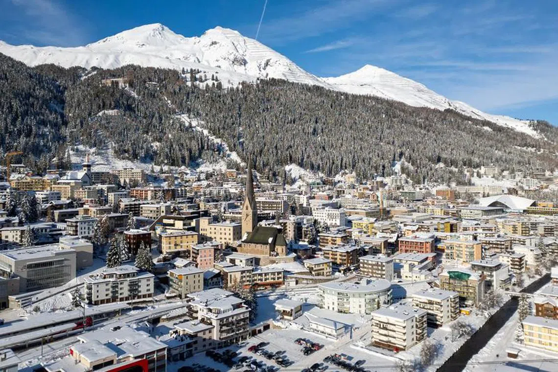FILE PHOTO: Overview of the town of Davos with the St. Johann church ahead of the annual meeting of the World Economic Forum (WEF), Switzerland, December 7, 2023.  REUTERS/Denis Balibouse/File Photo