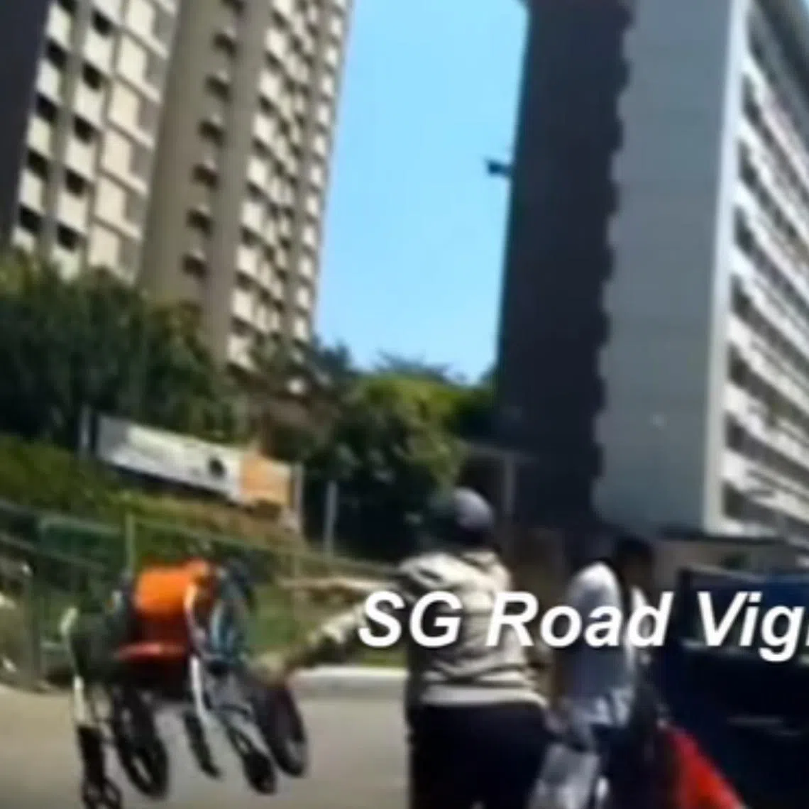 A driver of a ComfortDelGro taxi was filmed forcefully dumping a passenger’s wheelchair on a pavement.