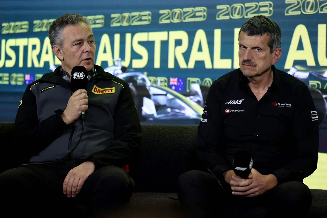 Director of Pirelli F1 Mario Isola (left) and Haas F1 team principal Guenther Steiner during a press conference at the Australian Grand Prix in March 2023.