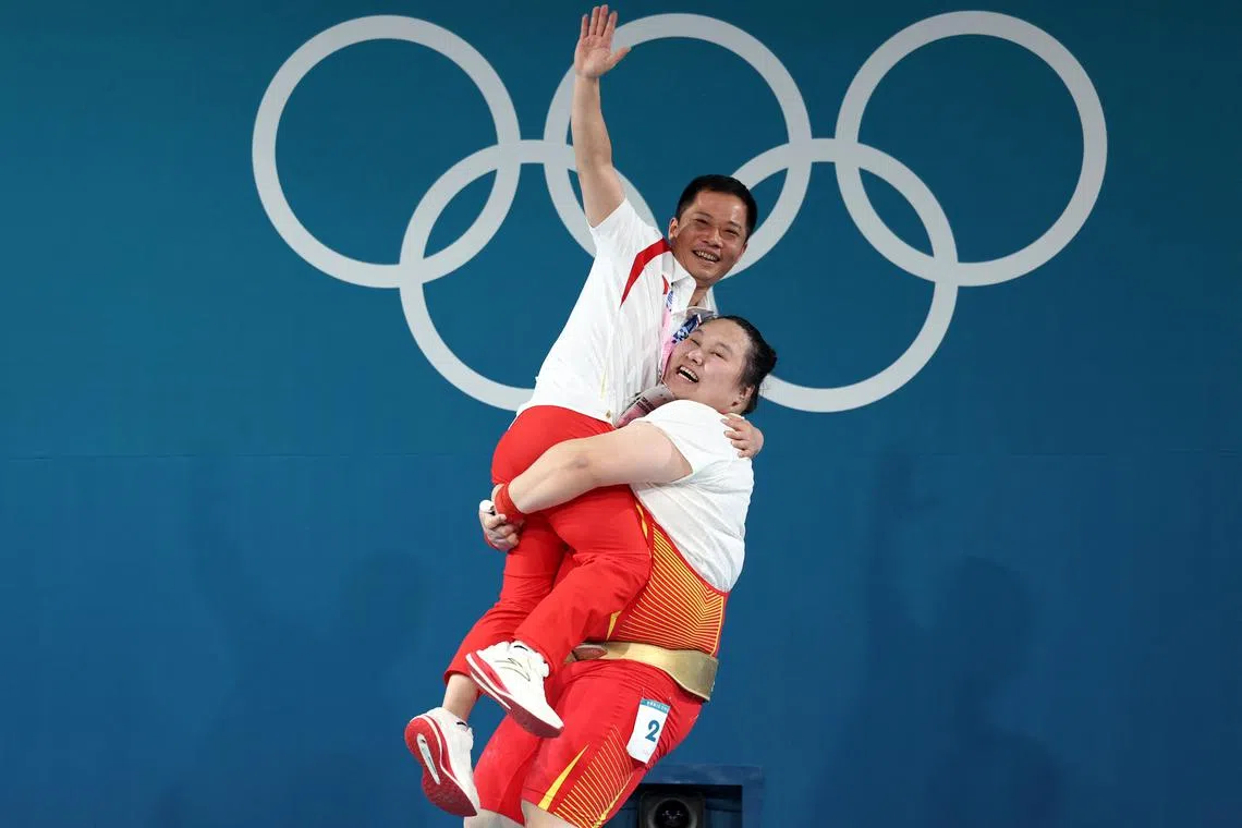 Weightlifting-China's Li takes second gold medal with dominant ...