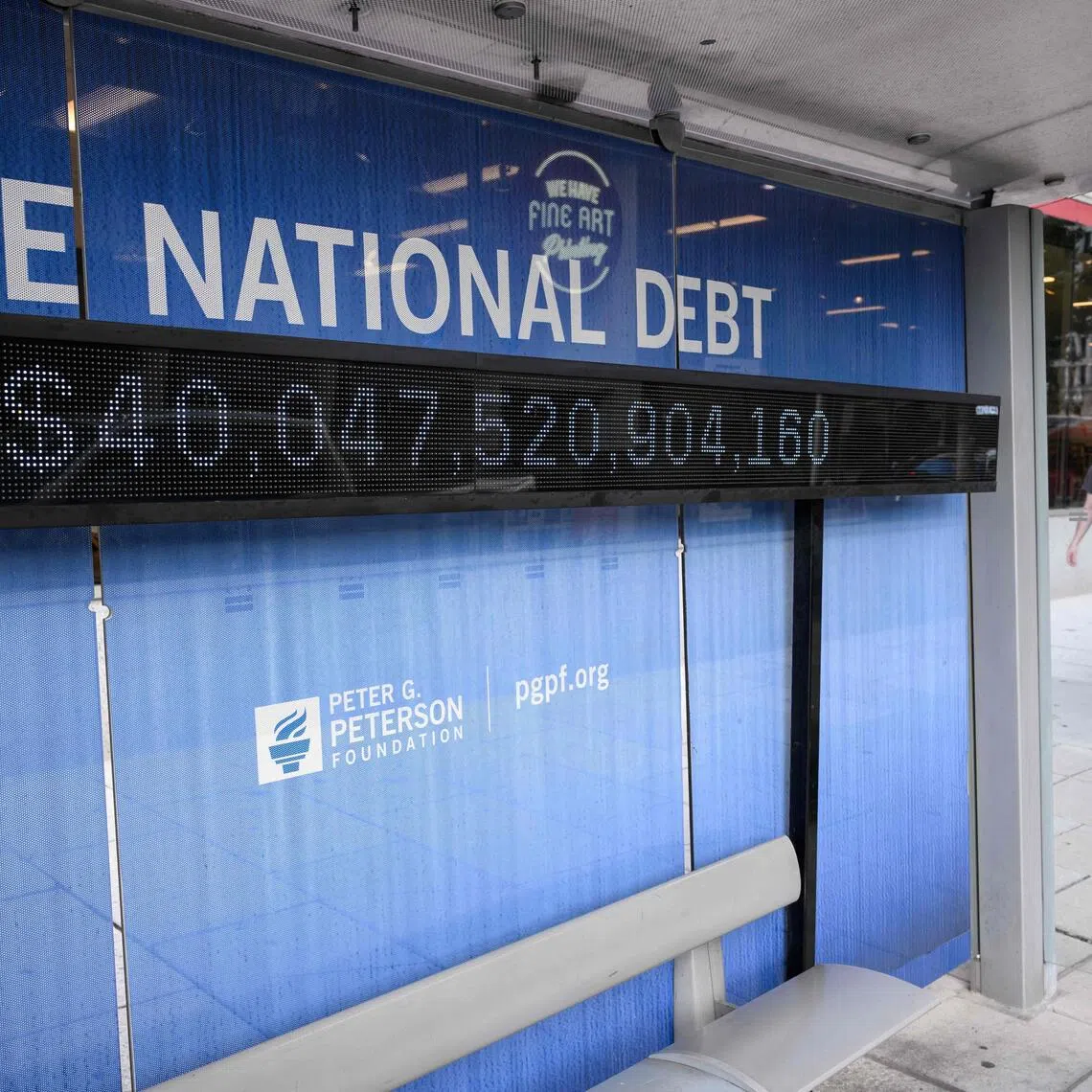An electronic display showing the national debt in Washington, DC on Aug 19.