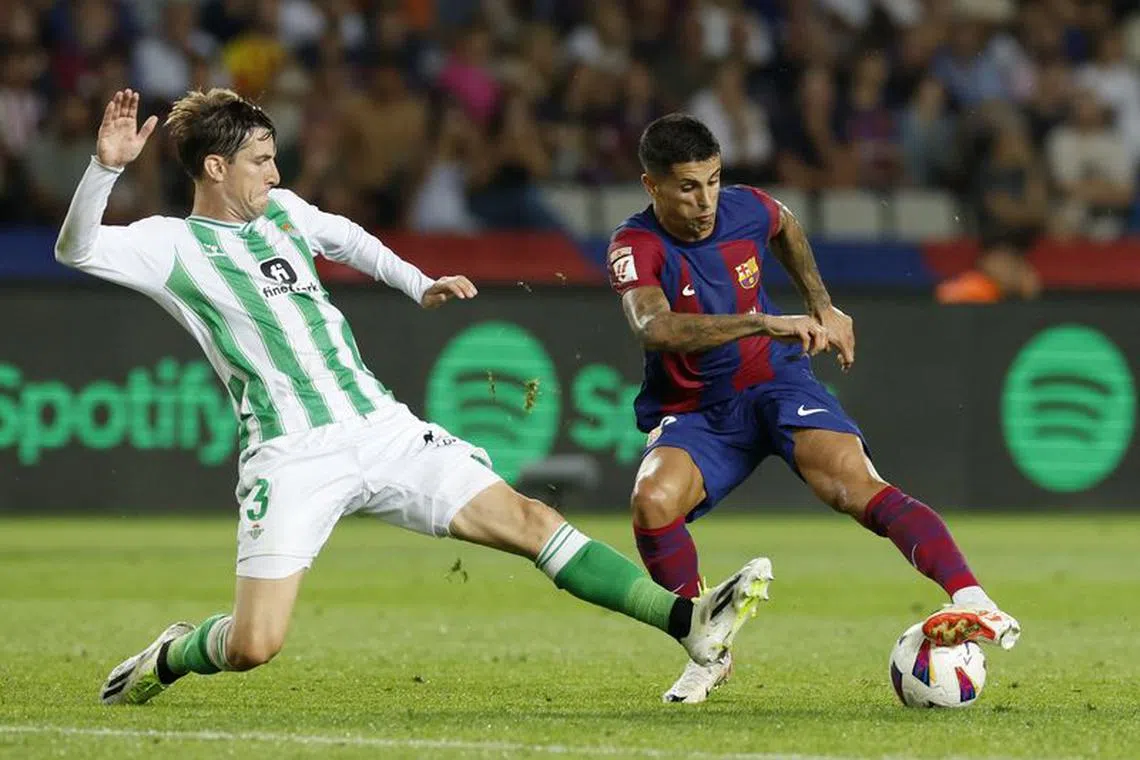 Soccer Football - LaLiga - FC Barcelona v Real Betis - Estadi Olimpic Lluis Companys, Barcelona, Spain - September 16, 2023 FC Barcelona's Joao Cancelo in action before he scores their fifth goal REUTERS/Albert Gea