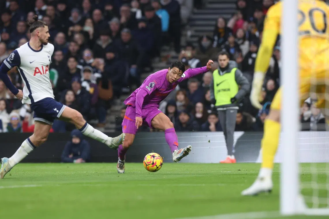 Radu Dragusin of Tottenham Hotspur trying to defend against Wolverhampton Wanderers' Hwang Hee-Chan during a 2-2 English Premier League draw at the Tottenham Hotspur Stadium on Dec 29.