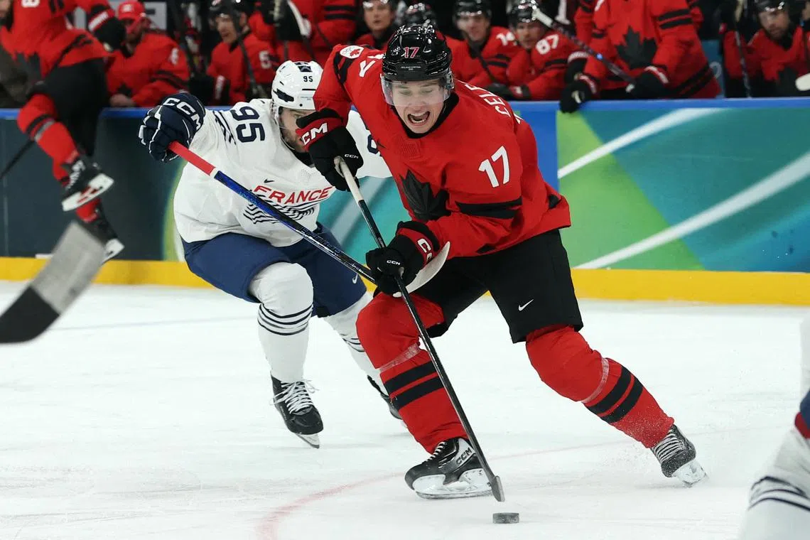 Ice hockey-Canada thrash France 10-2, Swiss top Czechs in OT, Denmark down Latvia
