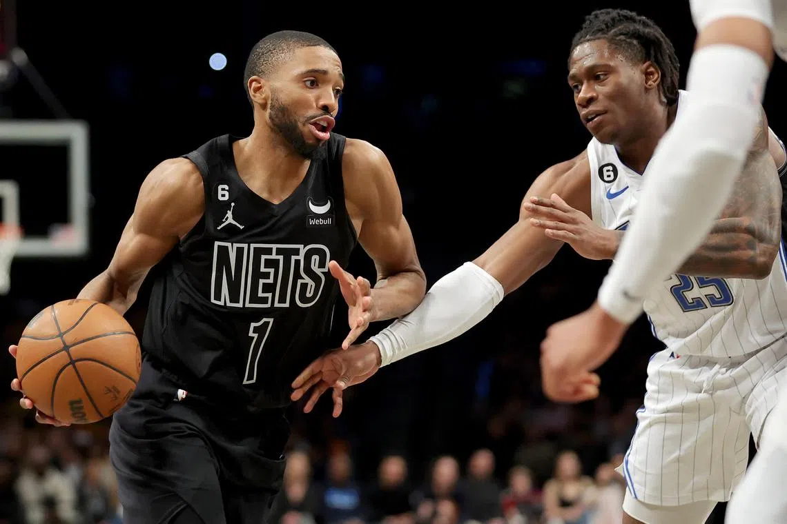 Brooklyn Nets forward Mikal Bridges driving to the basket against Orlando Magic forward Admiral Schofield during the fourth quarter at Barclays Centre on Friday. He scored 22 points as the Nets won 101-84.