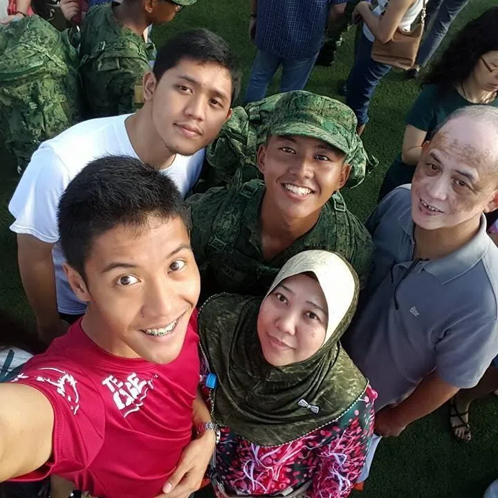captain muhammad alfian aman with parents and brothers at bmt pop ceremony in 2016