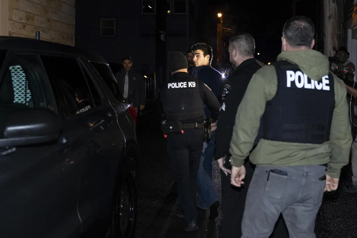 Luigi Mangione arrives for his arraignment at the courthouse in Altoona, Pa., Monday, Dec. 9, 2024. The 26-year-old Maryland native has been arrested in Altoona on gun charges and for questioning in connection with last week’s killing of a health insurance executive in Midtown Manhattan that prompted a manhunt up and down the East Coast, the New York Police Department said. (Rachel Wisniewski/The New York Times)