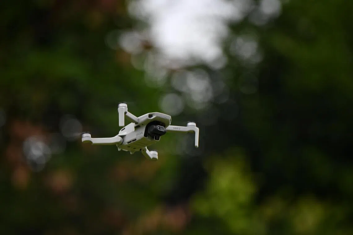 ST20220720_202232745374 Kua Chee Siong/ xwfly24-ol /
Generic pix of a DJI Mini 2 drone being used Drone Flying Academy during one of it's lessons at an open field near Sin Ming Lane on 20 July 2022.
A follow-up to the drones stories where Minister Iswaran said the number of registered unmanned aircraft has increased fourfold, that there is a sharp increase of recreational users and that there are 16,095 registered unmanned aircraft as of end June.
Drone Flying Academy, one of the experts, said that since their establishment in 2019, they saw a significant increase in the number of students, aged 7 to 70, signing up for classes. In 2019, the number of students signing up per month is about 20 and in 2022, it increased to 40.