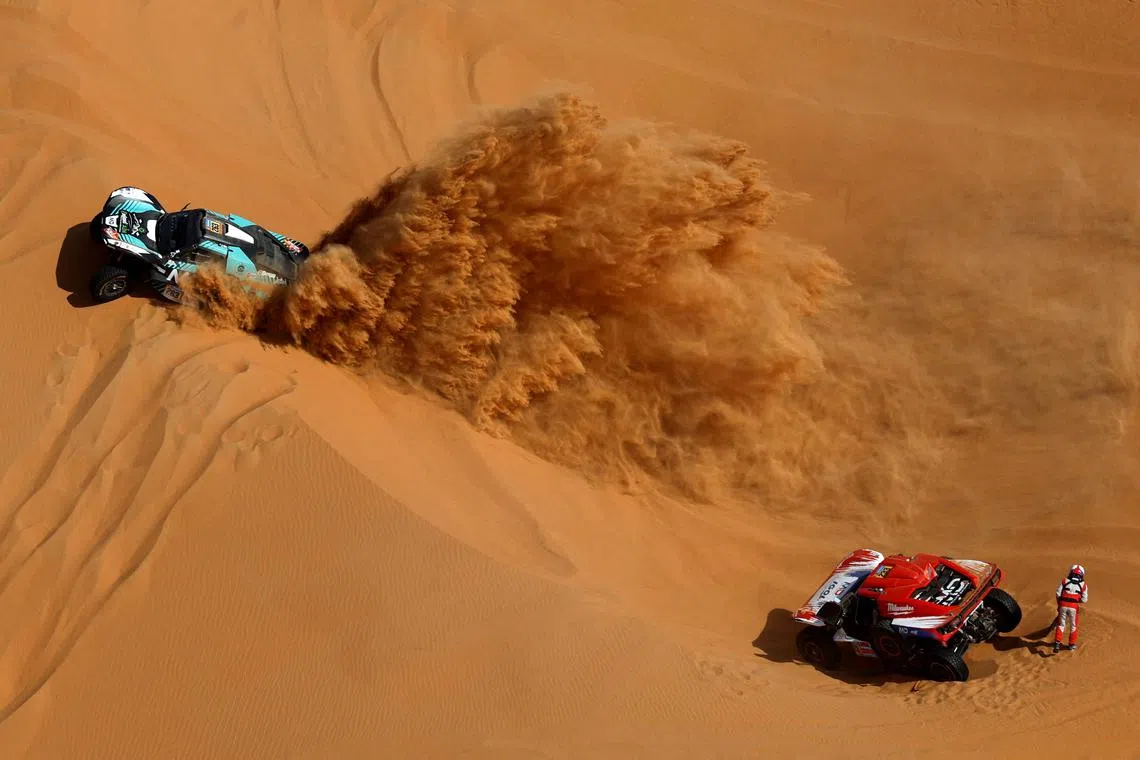 MD Rallye Sport's Ludovic Gherardi and Francois Borsotto in action with MD Rallye Sport's Simon Vitse and Max Delfino during the Dakar Rally in Saudi Arabia on Jan 16, 2025.