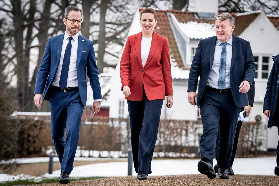 (From left) Mr Jakob Ellemann-Jensen of the Liberal Party, Prime Minister Mette Frederiksen and Mr Lars Lokke Rasmussen of the Moderates.