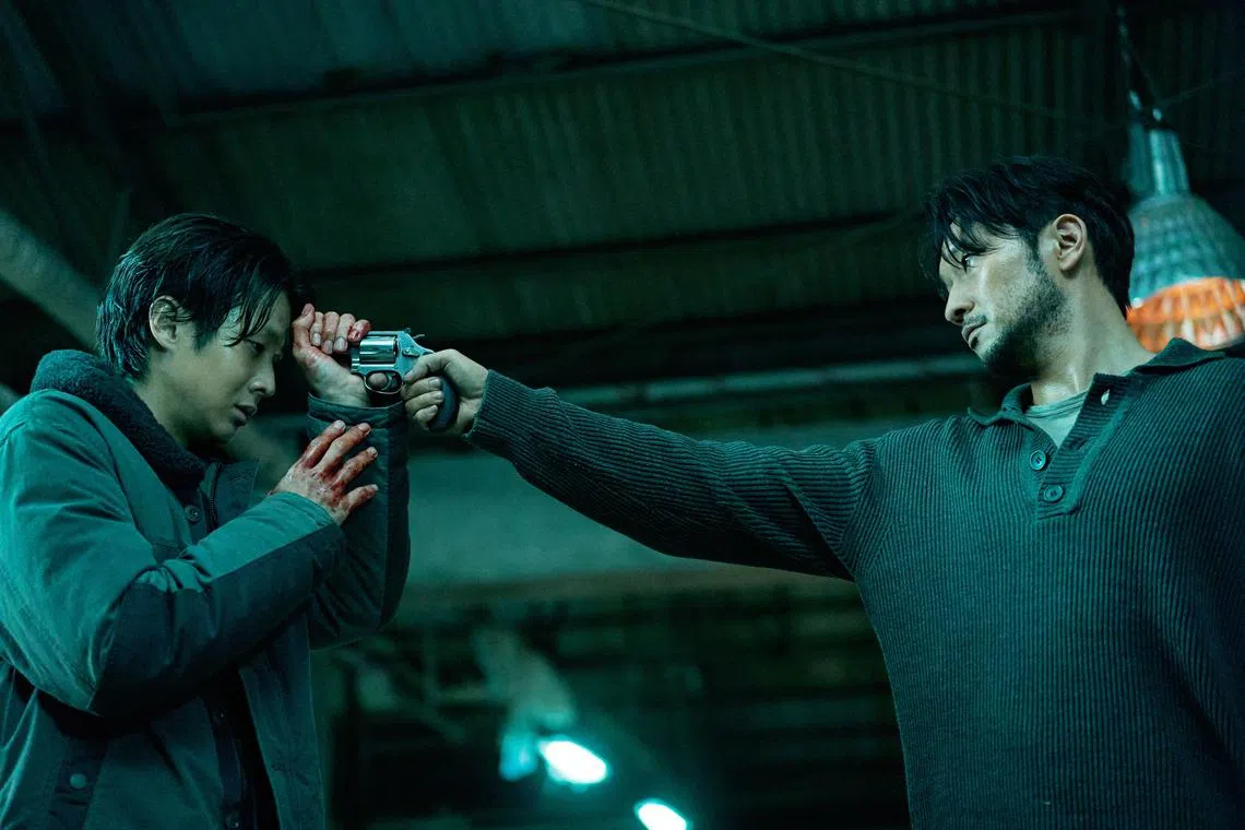 A Killer Paradox, starring Choi Woo-shik (left) and Son Suk-ku (right).