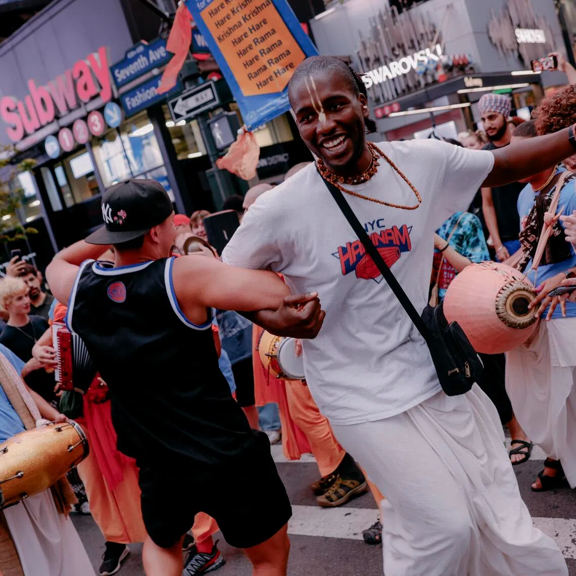 Fans of the New York Knicks dance before the start of Game 4 of the NBA Finals between the New York Knicks and the San Antonio Spurs near Madison Square Garden.