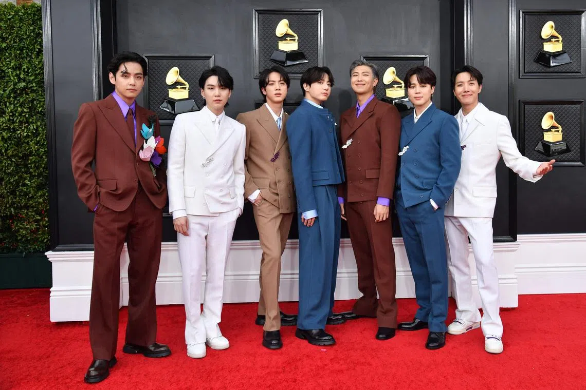 K-pop titan BTS, seen here at the 64th Annual Grammy Awards in April 2022, is on hiatus while its members serve in the South Korean army.