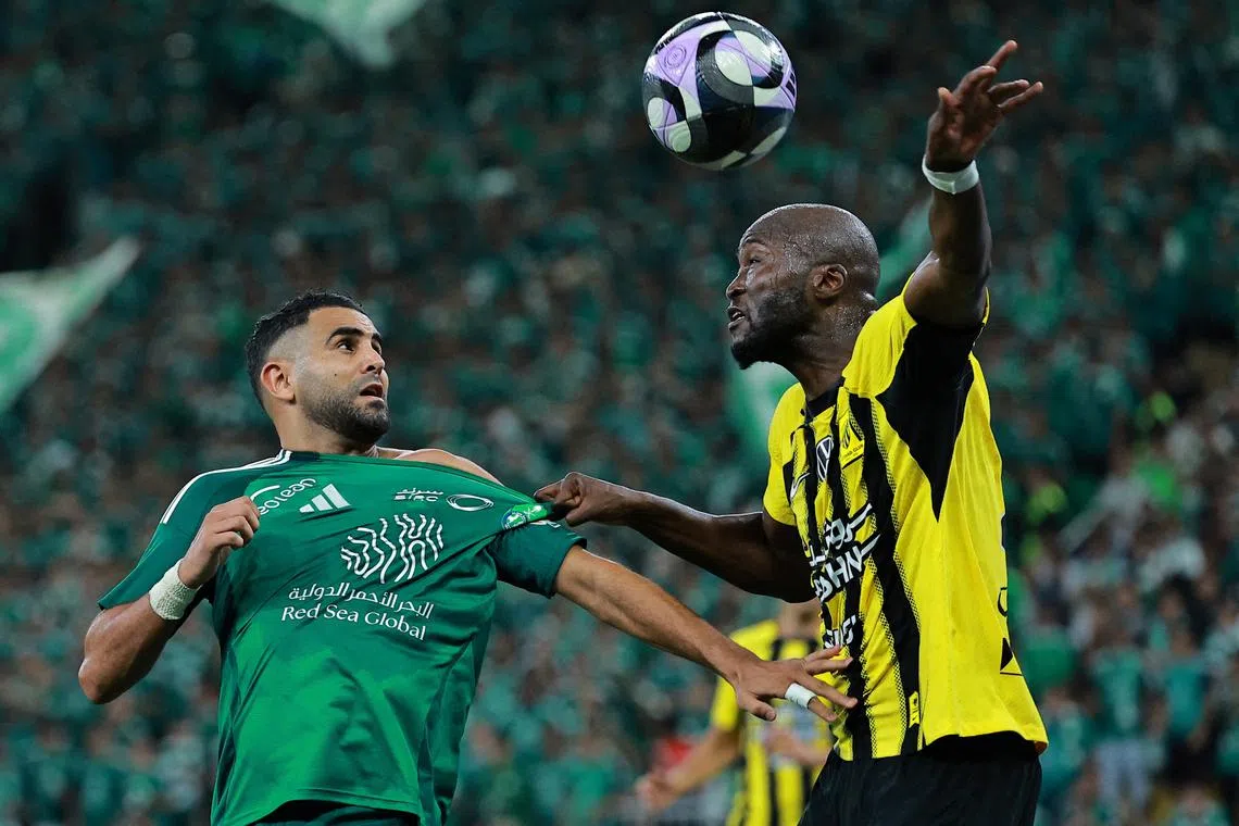 Soccer Football - Saudi Pro League - Al Ahli v Al Ittihad - King Abdullah Sport City, Jeddah, Saudi Arabia - April 5, 2025 Al Ahli's Riyad Mahrez in action with Al Ittihad's Danilo Pereira REUTERS/Stringer     TPX IMAGES OF THE DAY