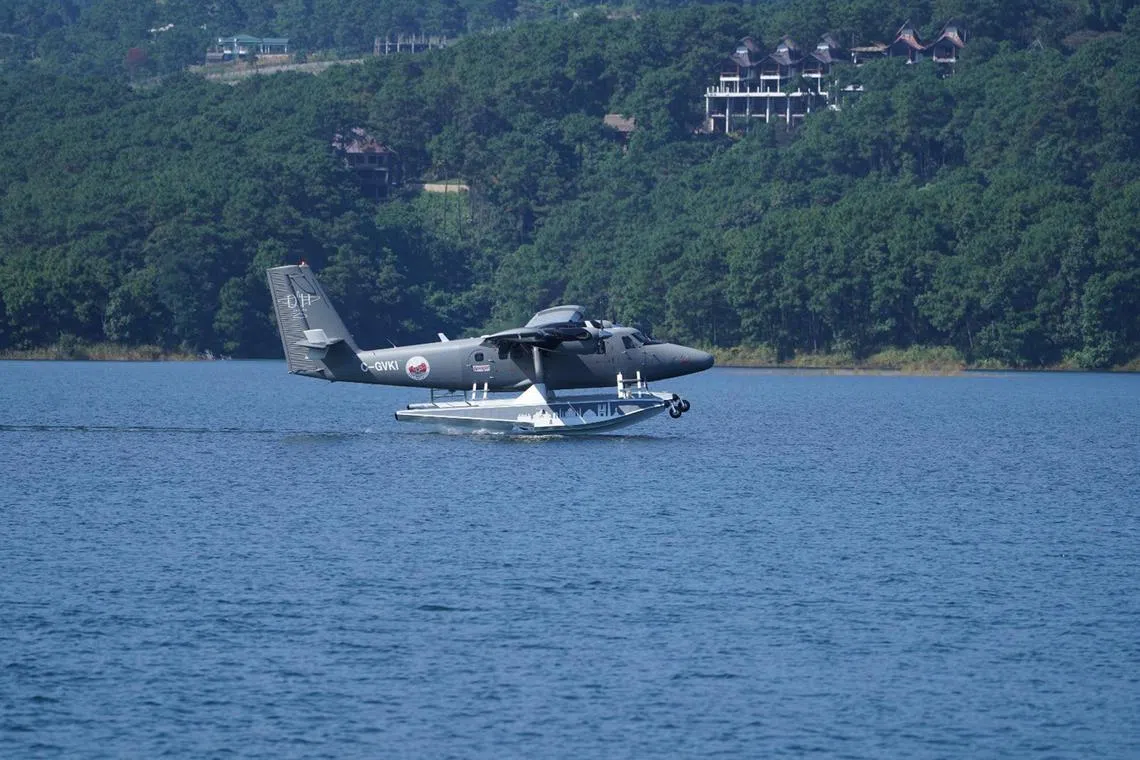 ddseaplane - GcV01PhWoAAX5re: An amphibious aircraft lands at Umiam Lake near Shillong as part of a seaplane demonstration flight on Nov 14. Credit: @RamMNK/X