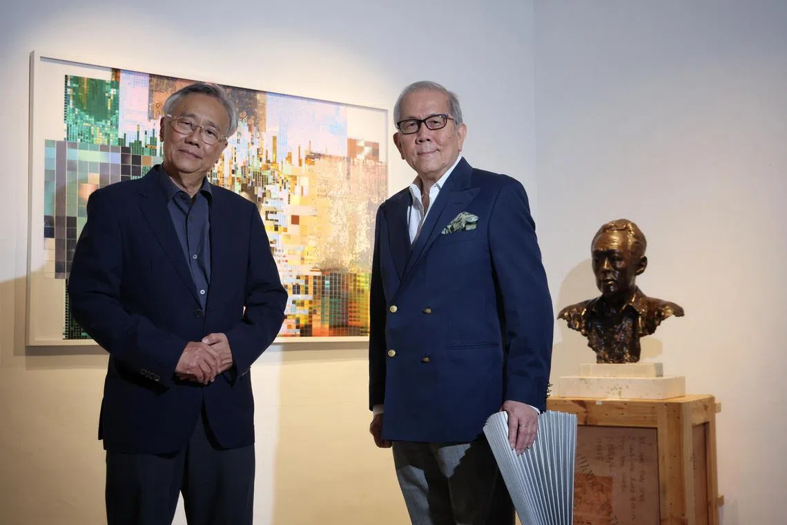 Culture Story founder Chong Huai Seng and curator Kwok Kian Chow, in front of Sydney Harpley's bust of Lee Kuan Yew and Ming Wong's Merdeka Dream (No. 1). 