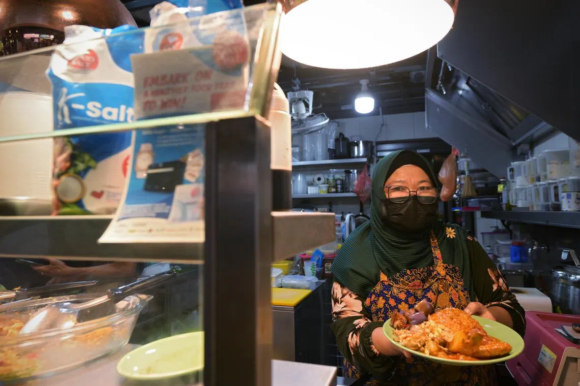 Ms Surayah Omar, who runs Meal Logi at Bukit Canberra Hawker Centre, uses the lower-sodium K-salt both for the food she sells, and at home.