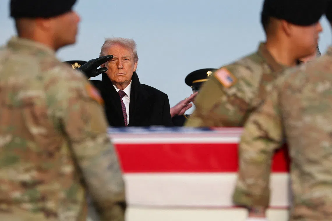 Trump marks return of US troops killed in Syria