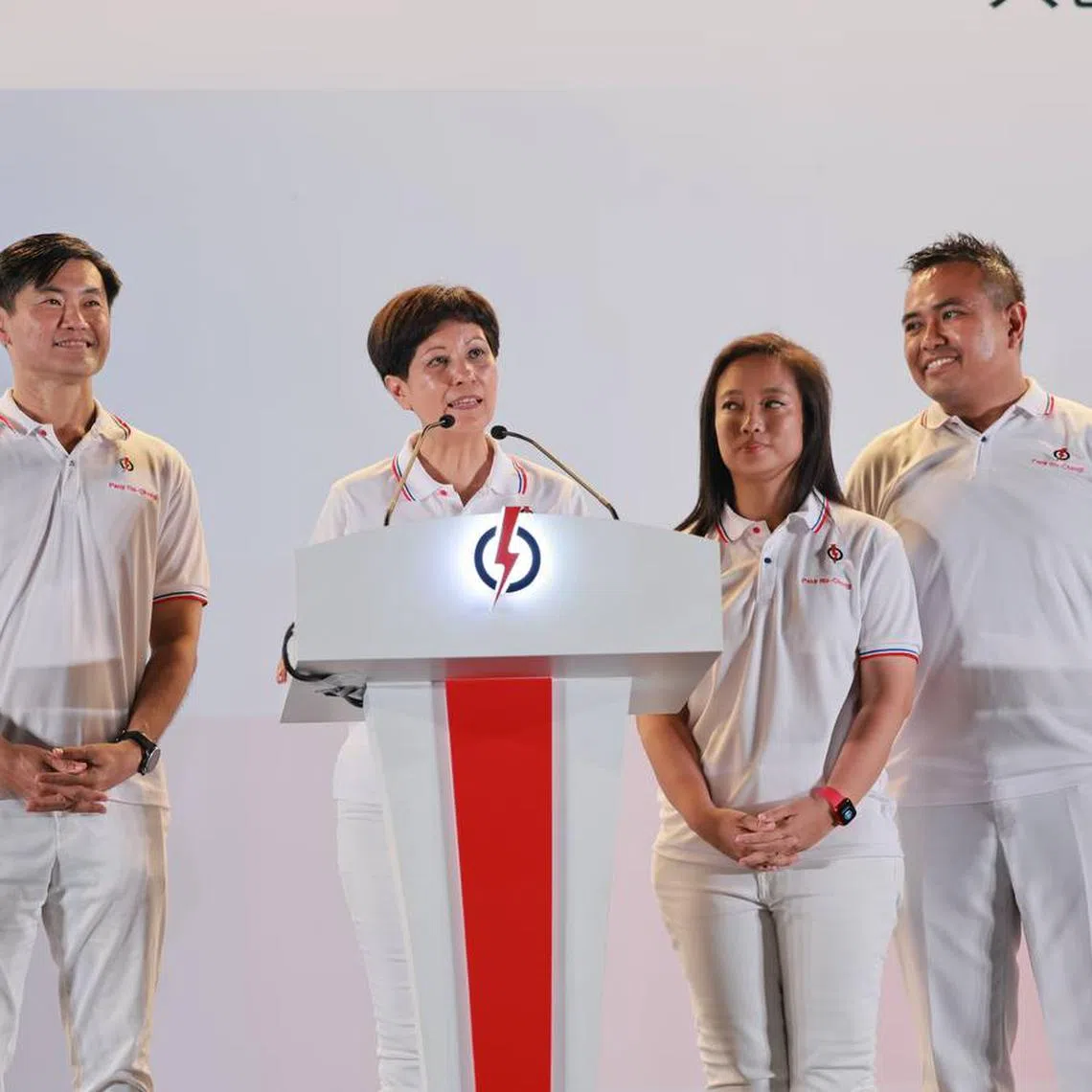 The PAP's Pasir Ris-Changi GRC candidates (from left) Desmond Tan, Indranee Rajah, Valerie Lee and Sharael Taha at Bedok Stadium early on May 4.