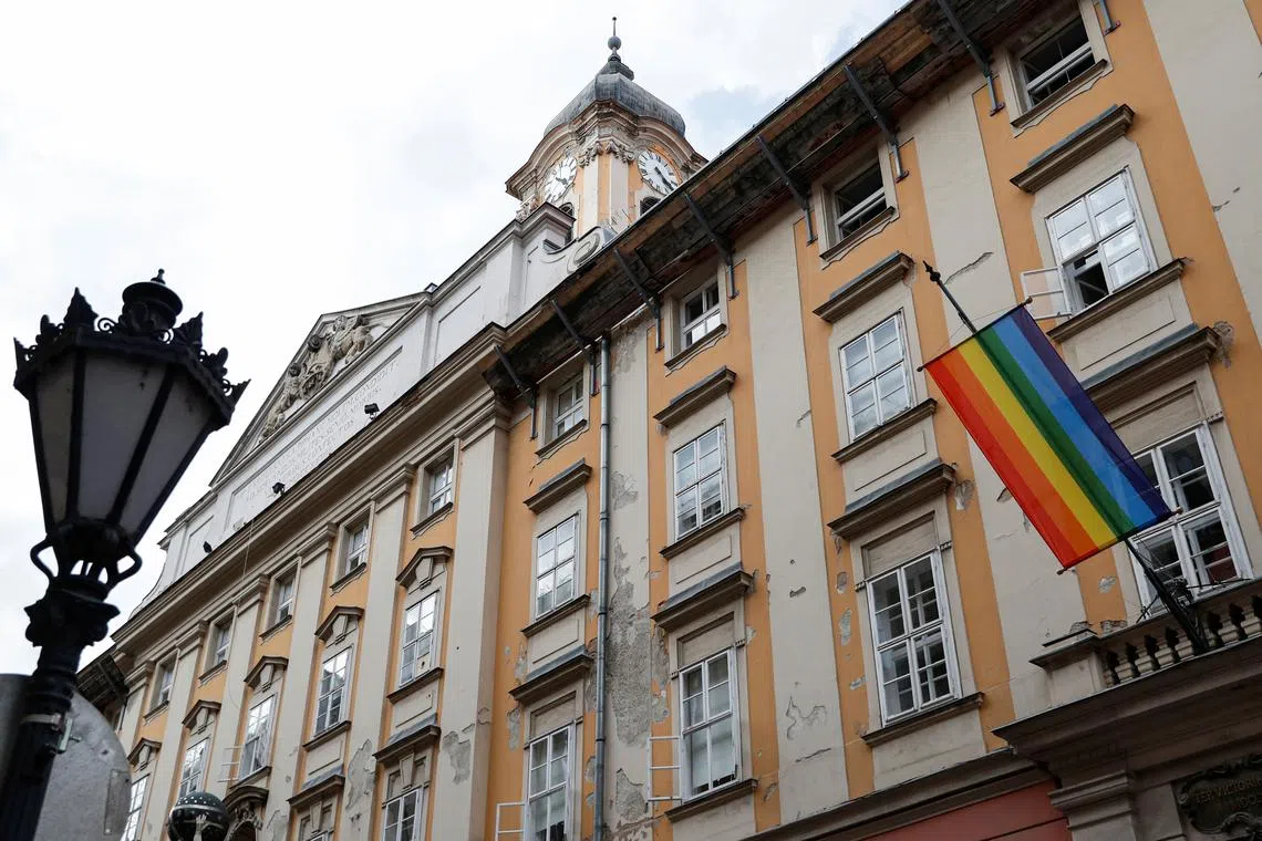 FILE PHOTO: The rainbow Pride flag hangs on the Budapest's mayor's office as the city celebrates the Pride month with a series of events in Budapest, Hungary, August 17, 2020. REUTERS/Bernadett Szabo/File Photo