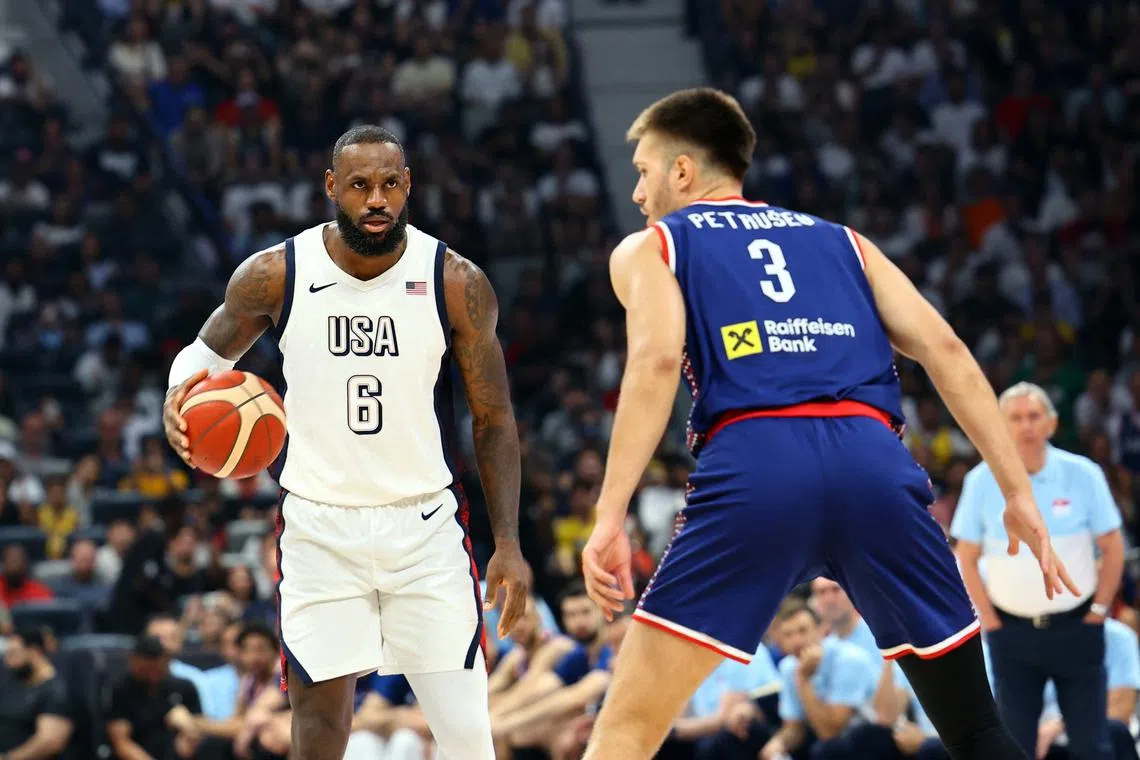 FILE PHOTO: Basketball - USA Basketball Showcase - United States v Serbia - Etihad Arena, Abu Dhabi, United Arab Emirates - July 17, 2024 LeBron James of the U.S.in action REUTERS/Rula Rouhana