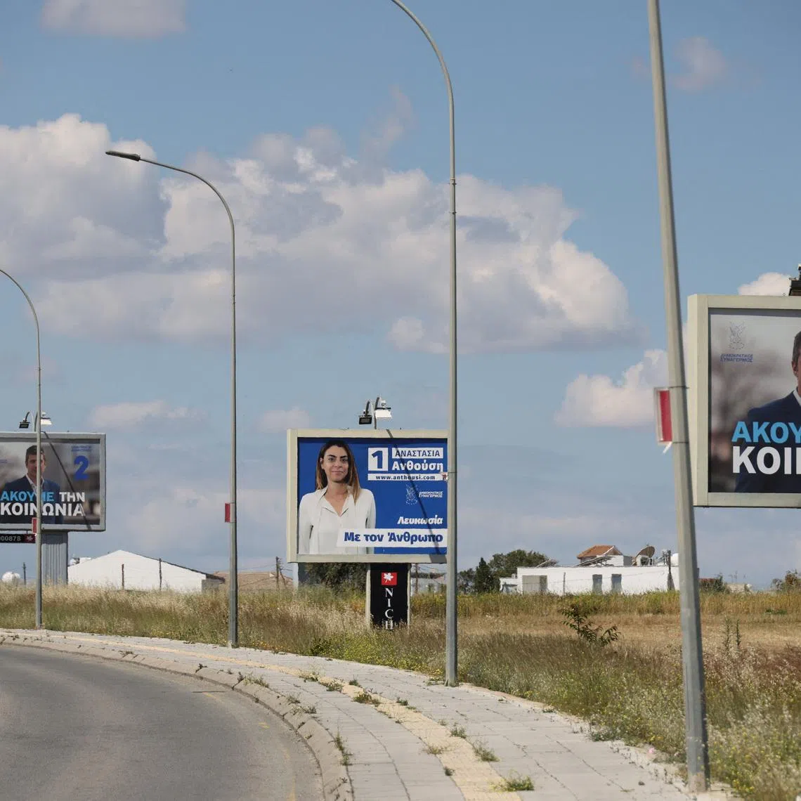 Election campaign billboards of candidates for Cyprus parliamentary election, to be held on May 24, are placed on a street in Nicosia, Cyprus May 6, 2026. REUTERS/Yiannis Kourtoglou