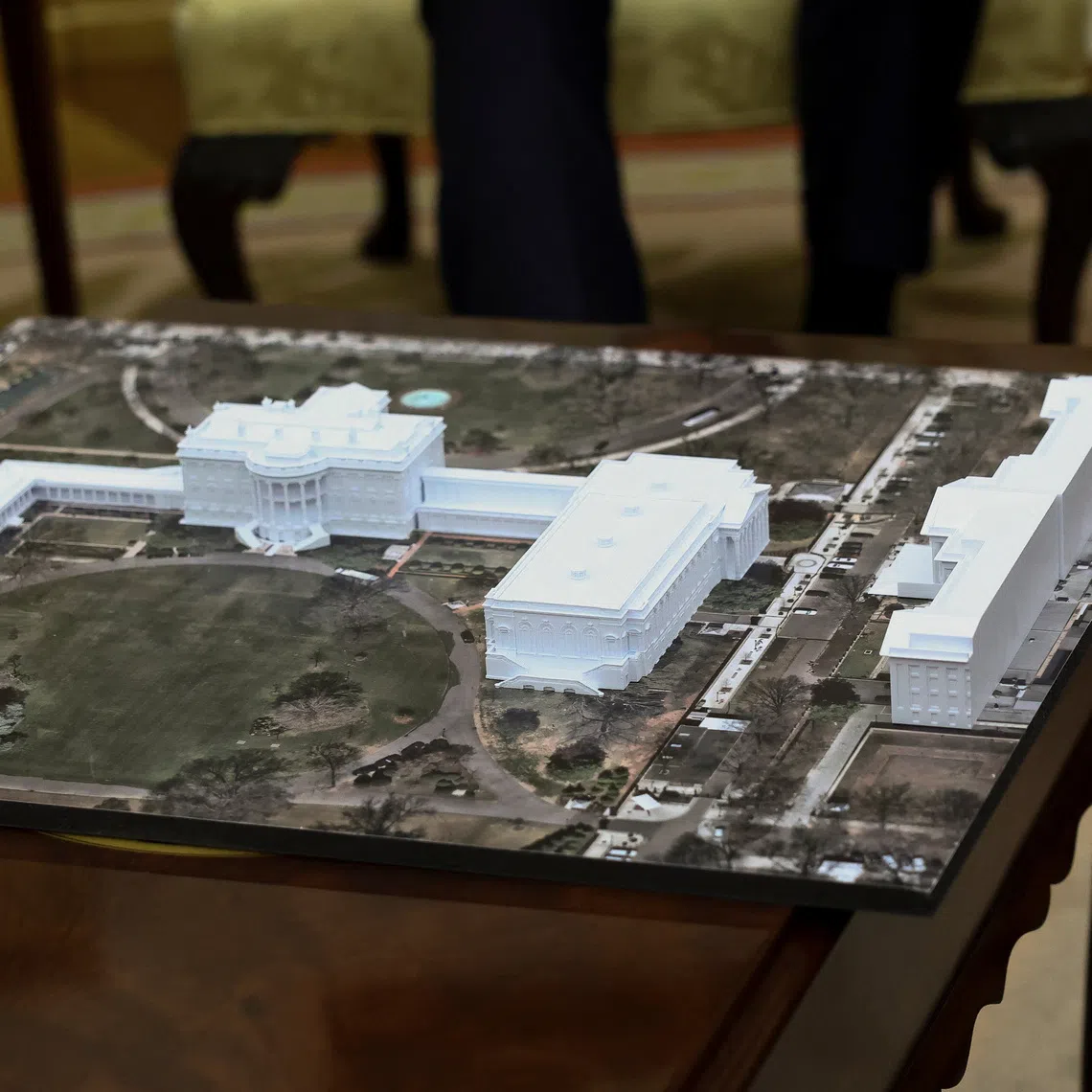 A model of the new White House ballroom on display in the Oval Office of the White House on Oct 22.