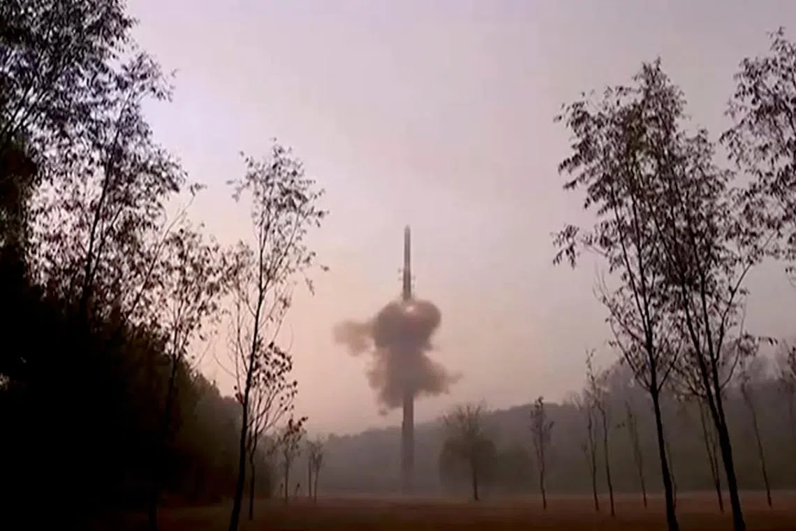A view shows what North Korea says is a Hwasong-19 missile being launched at an undisclosed location in this screengrab obtained from a video released on Nov 1. 