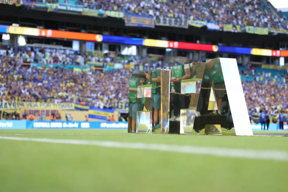 Jun 16, 2025; Miami Gardens, Florida, USA; FIFA signage is seen on the pitch prior to a match between CA Boca Juniors and SL Benfica in a group stage match of the 2025 FIFA Club World Cup at Hard Rock Stadium. Mandatory Credit: Nathan Ray Seebeck-Imagn Images