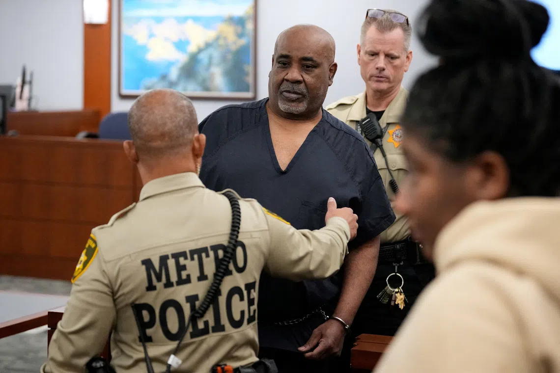 Duane Davis is escorted by police from a sentencing hearing after his murder conviction in the death of rapper Tupac Shakur on Oct 13, in Las Vegas, Nevada, US.