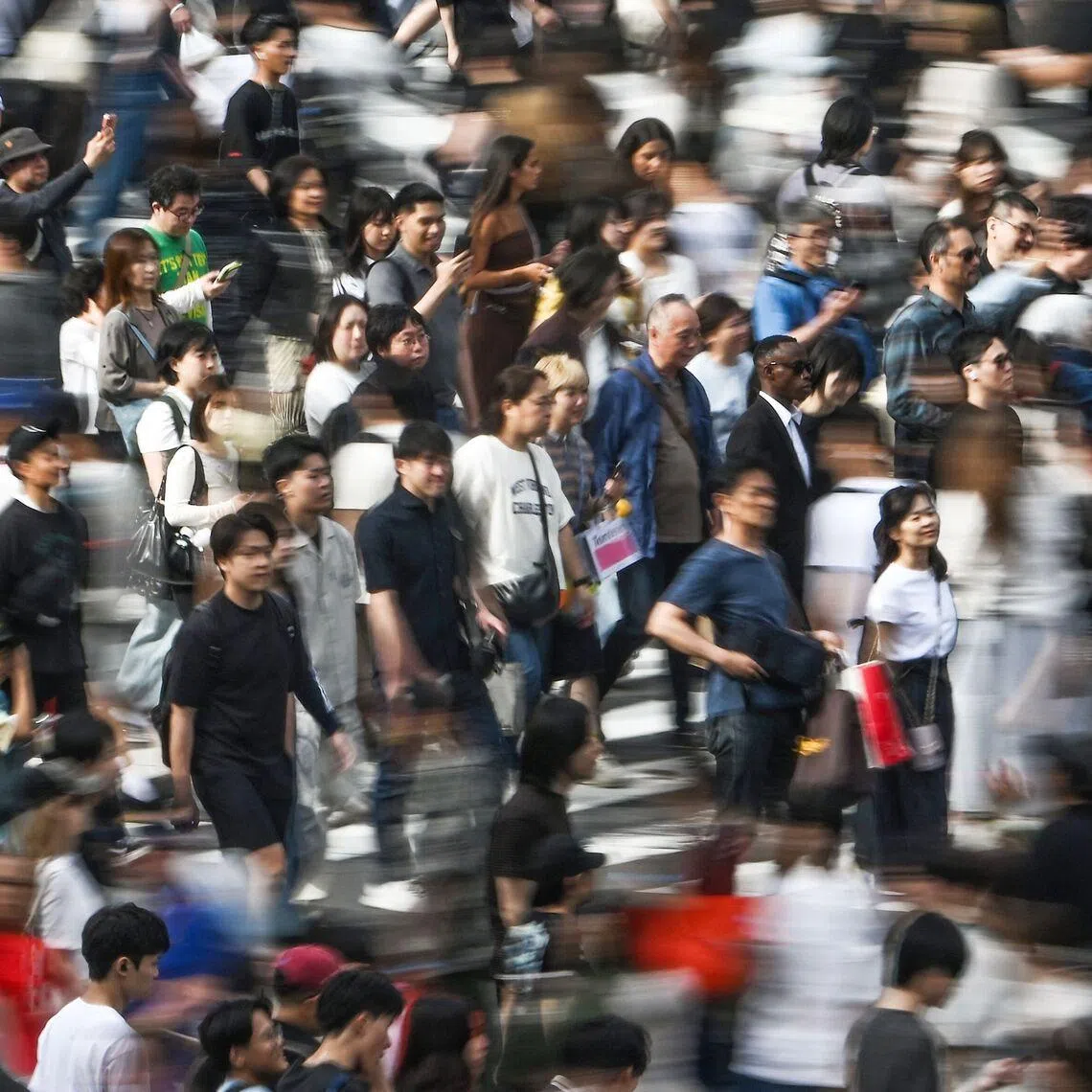 Japan’s Shibuya crossing, famous for its disciplined pedestrians, was the site of a viral video where a woman roughly slams into a child posing for a photo.
