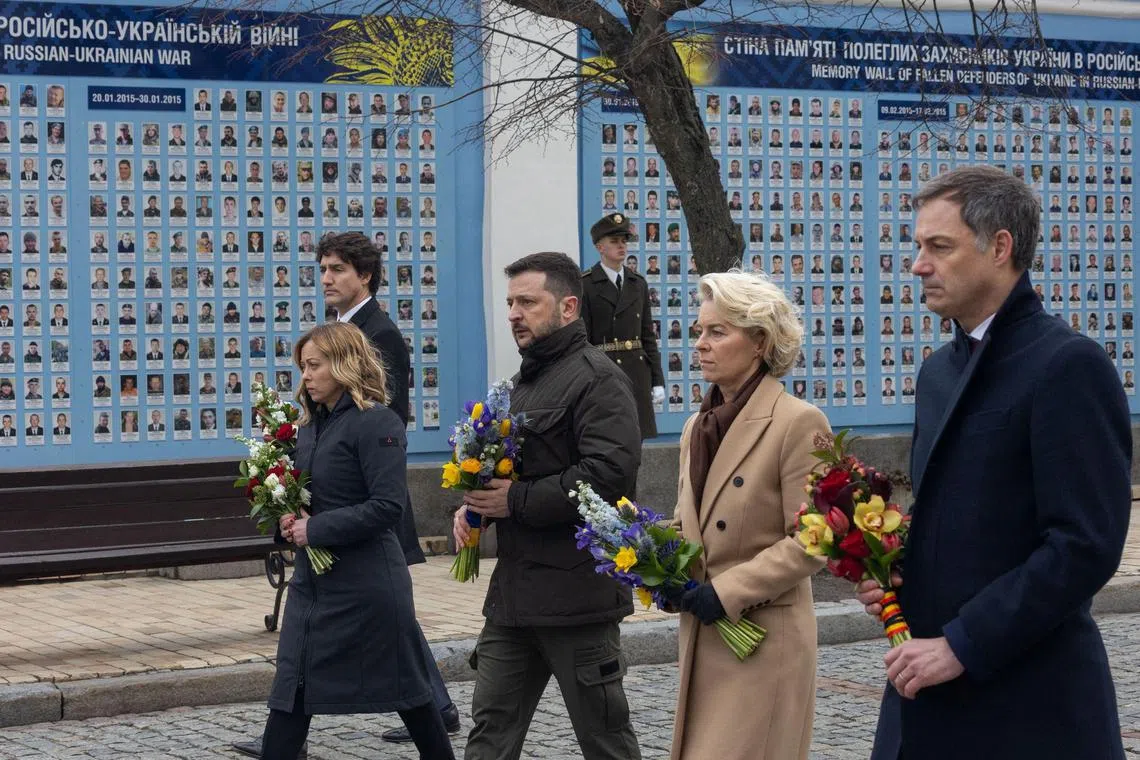 (From left) Canada's Mr Trudeau, Italy's Ms  Meloni, Ukraine's Mr Zelensky, Ms Ursula von der Leyen, of the European Commission, and Belgium's Mr De Croo attend an anniversary ceremony in Kyiv.