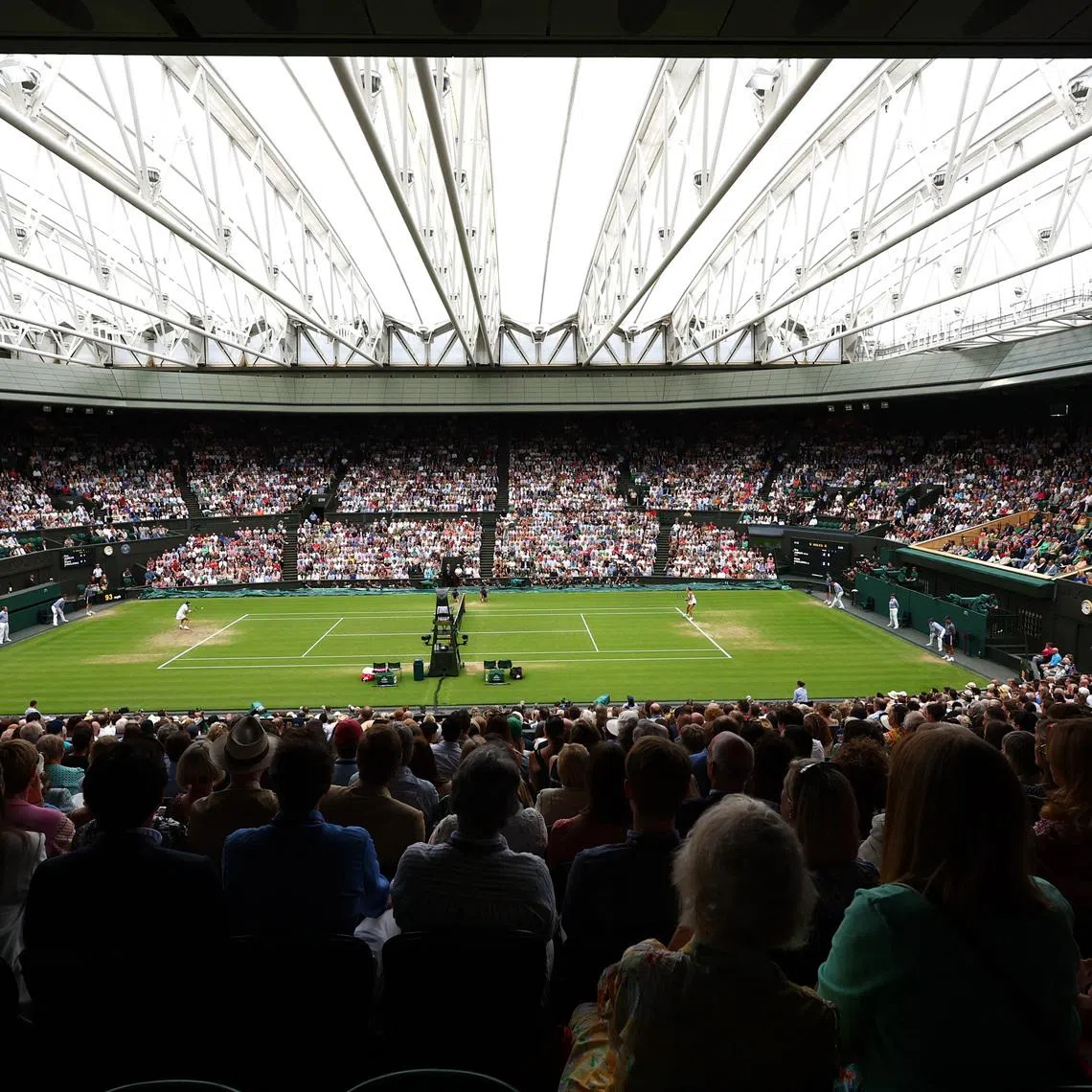 Tennis - Wimbledon - All England Lawn Tennis and Croquet Club, London, Britain - July 13, 2023 General view as spectators watch the semi final match between Tunisia’s Ons Jabeur and Belarus’ Aryna Sabalenka on centre court REUTERS/Toby Melville