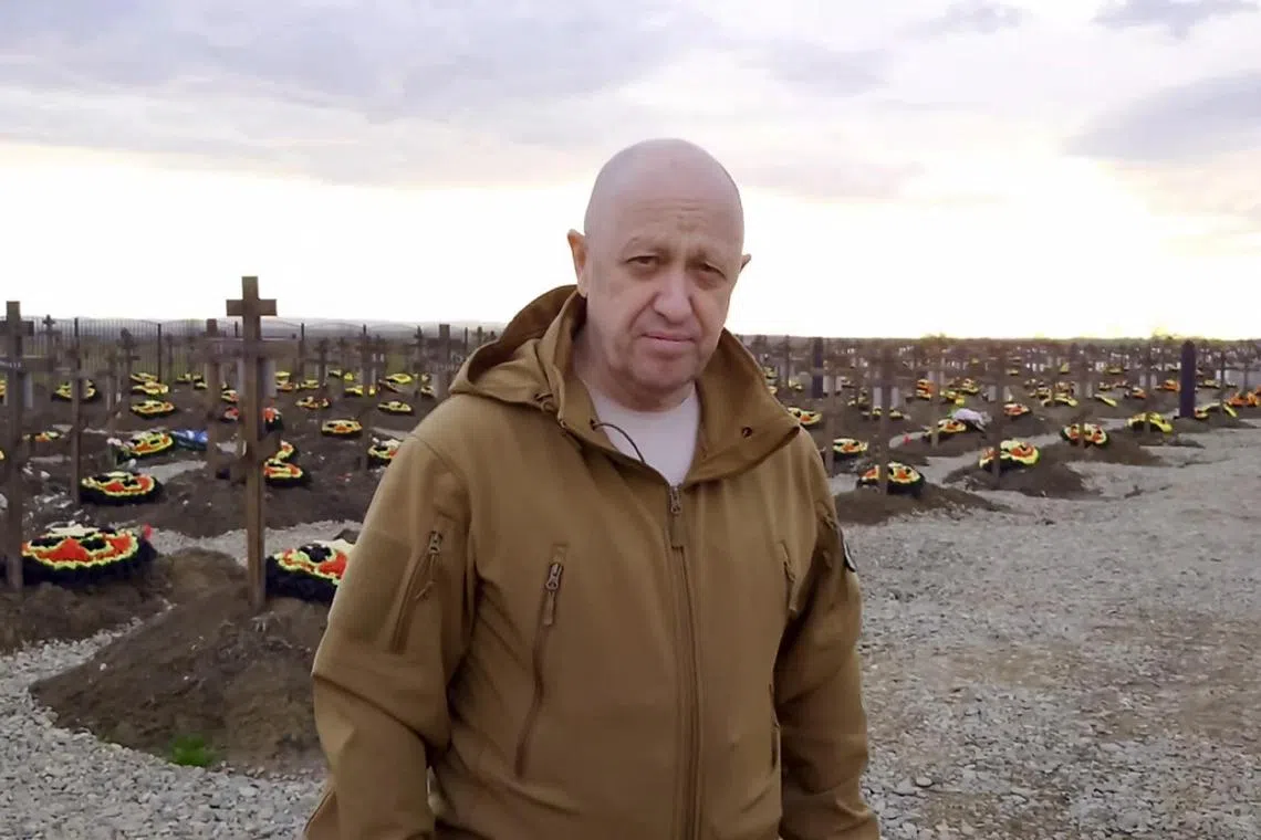 A video grab shows Wagner chief Yevgeny Prigozhin at a cemetery for fallen Wagner fighters in southern Russia.