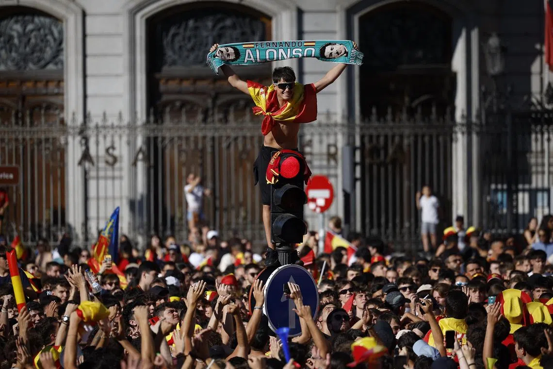 Soccer Football - Euro 2024 - Spain Parade after winning Euro 2024 - Madrid, Spain - July 15, 2024 Spain fans gather on Plaza Cibeles ahead of the parade REUTERS/Juan Medina