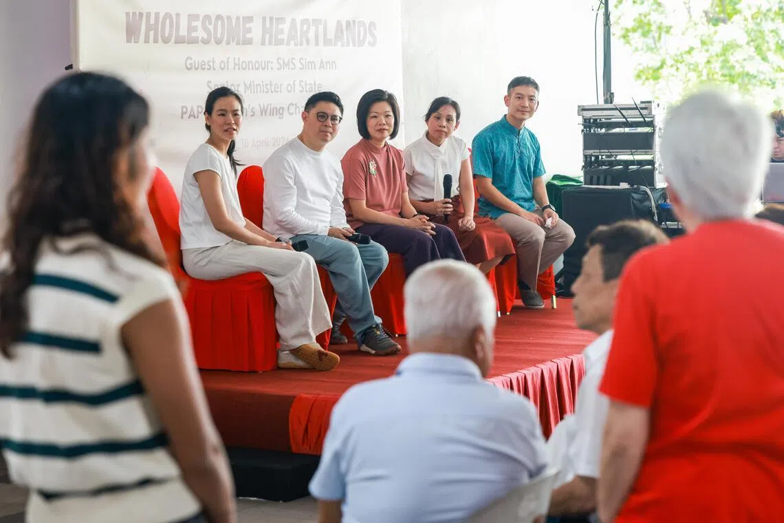 Mrs Bernadette Giam, Mr Foo Cexiang, Ms Sim Ann, Ms Elysa Chen, and Mr Shawn Loh speaking to participants of the community dialogue session on April 18.