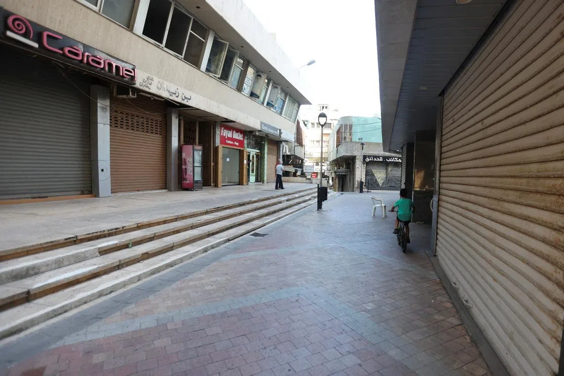 Closed shops in Sidon, Lebanon, on Sept 18, following pager detonations across the country.