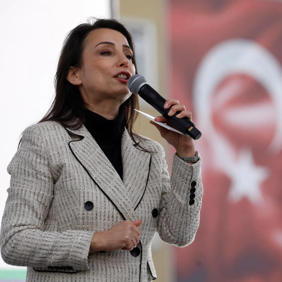 Tulay Hatimogullari, co-chair of pro-Kurdish Peoples' Equality and Democracy Party (DEM Party), addresses their supporters during a rally in Istanbul, Turkey, February 2, 2025. REUTERS/Dilara Senkaya