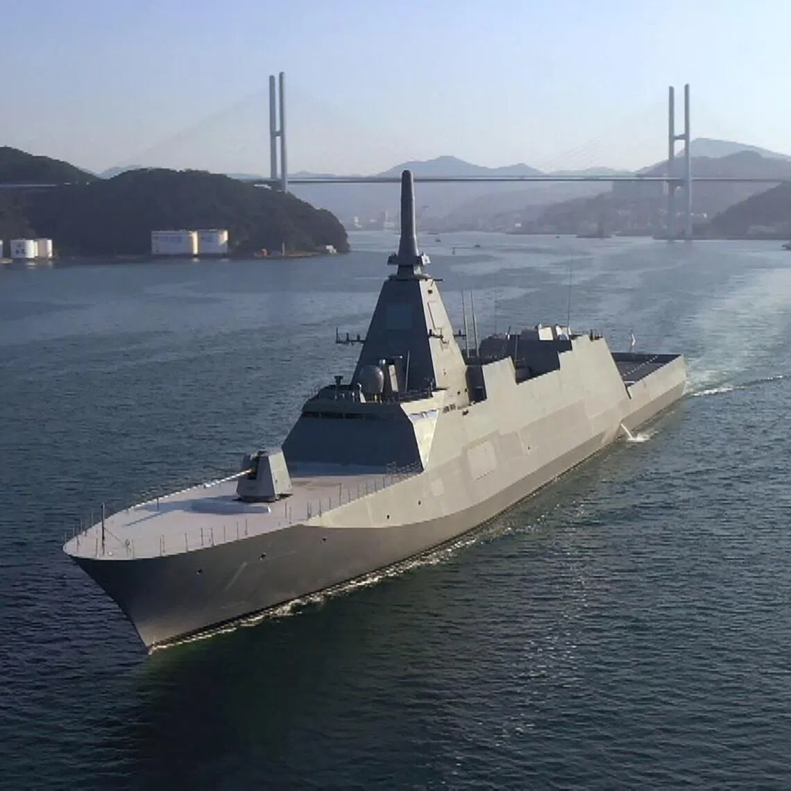 (FILES) This undated handout photo released by the Australian Defence Force on August 5, 2025 shows the Japanese Maritime Self-Defence Force (JMSDF) frigate JS Mogami (FFM-1) sailing in an undisclosed location. Long-pacifist Japan has shed its self-imposed ban on lethal weaponry exports, gunning for a prominent place in the global defence trade -- a challenging feat that analysts say could take years to achieve. (Photo by Handout / AUSTRALIAN DEFENCE FORCE / AFP) / RESTRICTED TO EDITORIAL USE - MANDATORY CREDIT "AFP PHOTO / AUSTRALIAN DEFENCE FORCE" - NO MARKETING - NO ADVERTISING CAMPAIGNS - DISTRIBUTED AS A SERVICE TO CLIENTS
To go with 'JAPAN-DEFENCE-TRADE, FOCUS' by Hiroshi Hiyama and Julien Girault