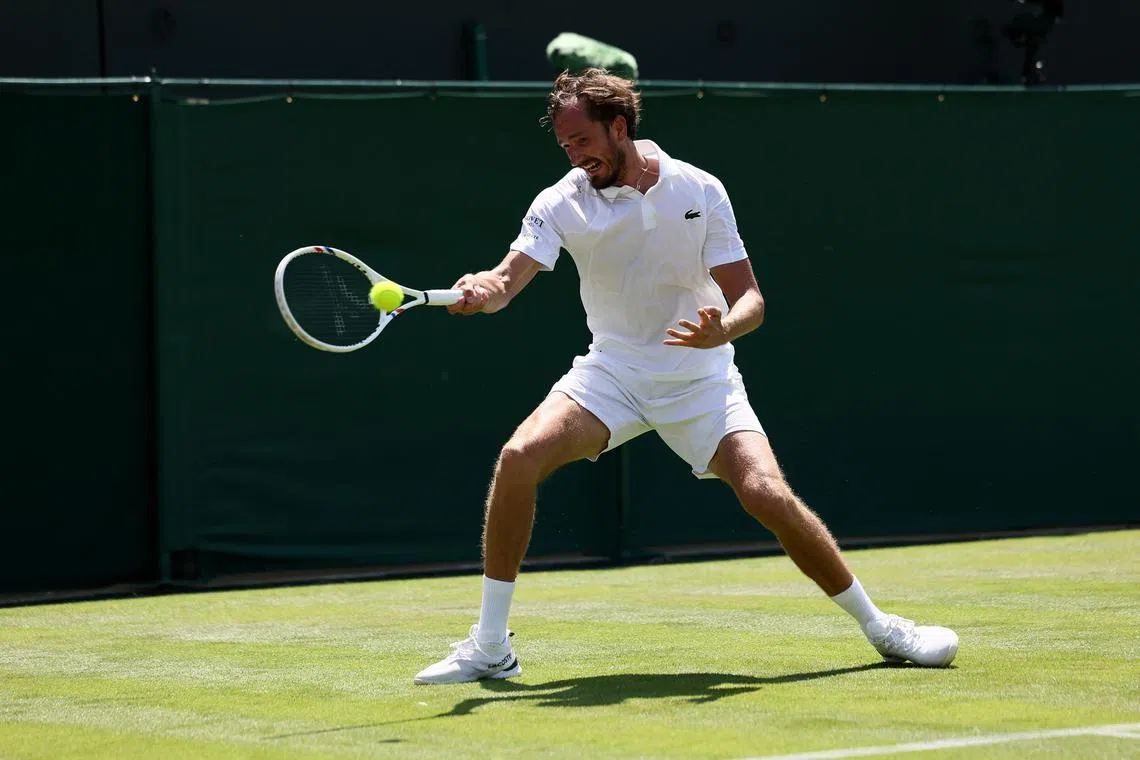 Tennis - Wimbledon - All England Lawn Tennis and Croquet Club, London, Britain - June 30, 2025 Russia's Daniil Medvedev in action during his first round match against France's Benjamin Bonzi REUTERS/Isabel Infantes