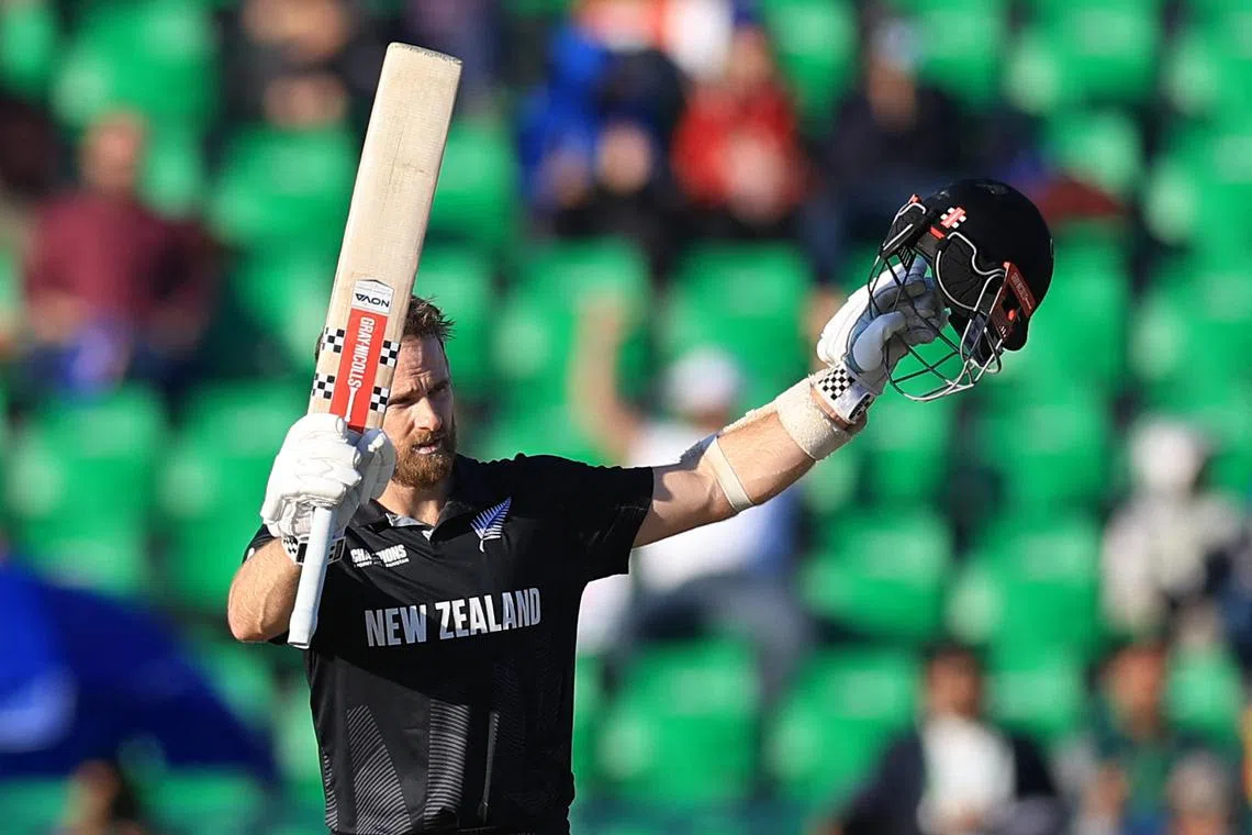 FILE PHOTO: Cricket - ICC Men's Champions Trophy - Semi Final - South Africa v New Zealand - Gaddafi Stadium, Lahore, Pakistan - March 5, 2025 New Zealand's Kane Williamson celebrates after reaching his century REUTERS/Akhtar Soomro/File Photo