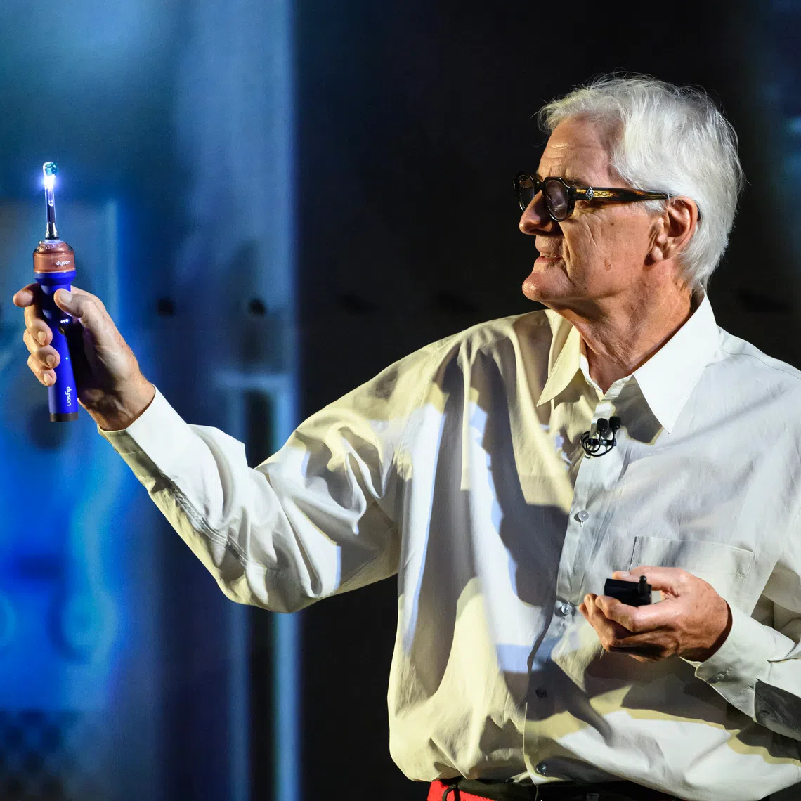 James Dyson with Dyson CameraJet toothbrush