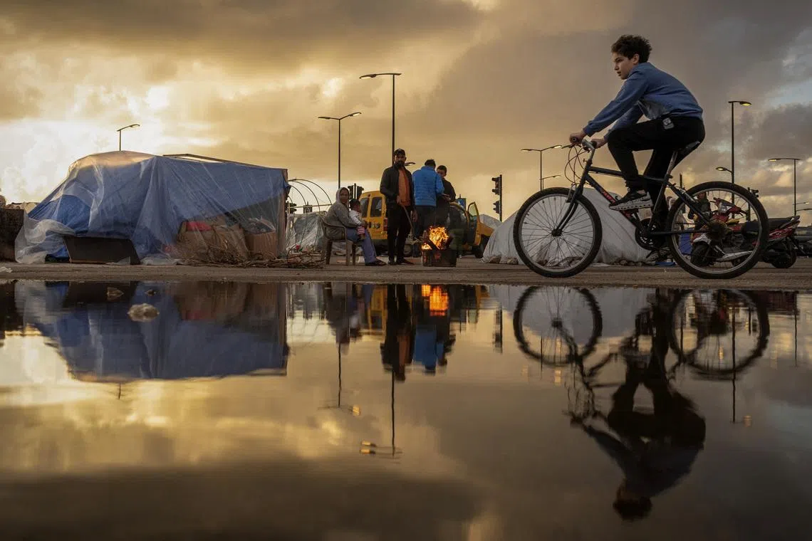 The Week in Pictures: Displaced people in Beirut; Good Friday service in Sydney