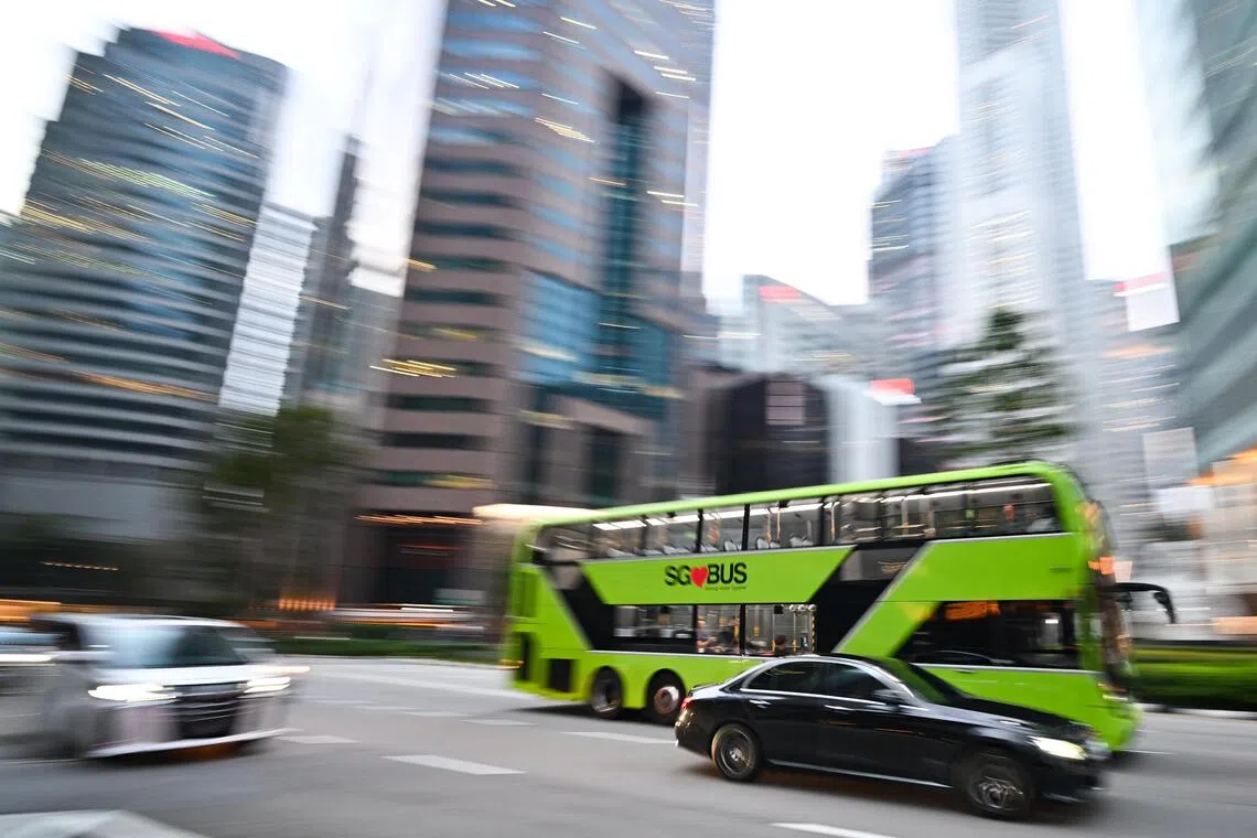 Bus operator Tower Transit said a man at a bus stop noticed a bus driver slumped in the cabin and banged on the doors to raise the alarm.