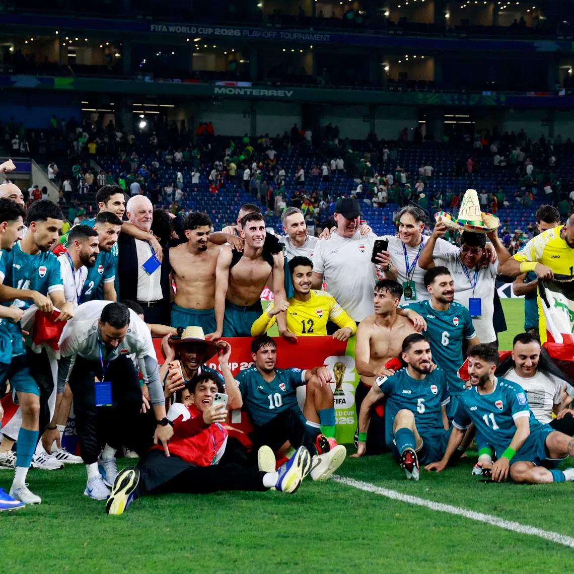 Soccer Football - FIFA World Cup - Inter-Confederation Playoffs - Final - Iraq v Bolivia - Estadio Monterrey, Monterrey, Mexico - March 31, 2026 Iraq players celebrate after qualifying for FIFA World Cup. REUTERS/Daniel Becerril