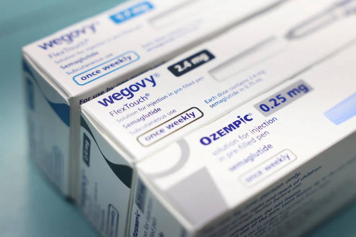 Boxes of Ozempic and Wegovy made by Novo Nordisk are seen at a pharmacy in London, Britain March 8, 2024. REUTERS/Hollie Adams
