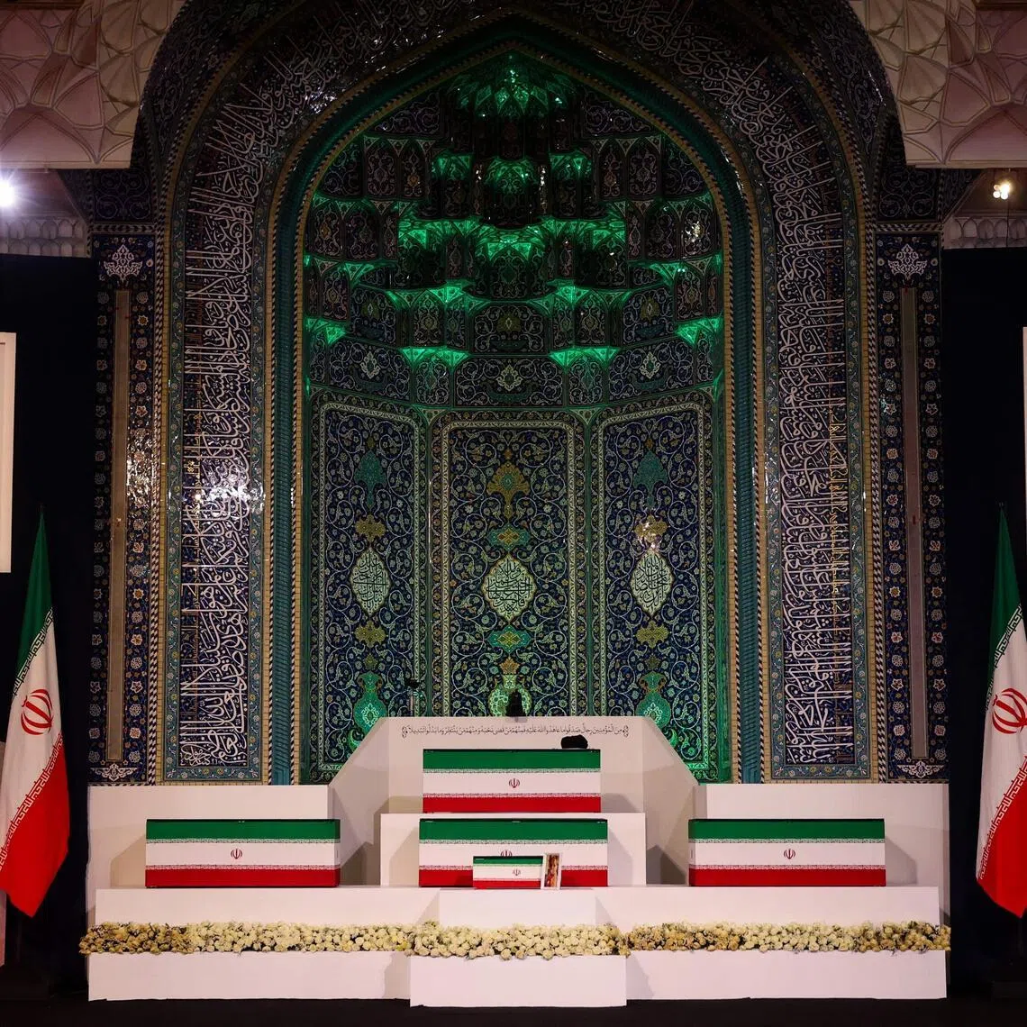 The coffins of Iran’s slain supreme leader Ali Khamenei and his family members are pictured at the Grand Mosalla in Tehran on July 3.