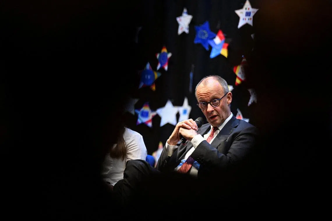 German Chancellor Friedrich Merz speaks during a panel discussion with students during his visit to the Carolus-Magnus-Gymnasium, as part of the EU Project Day in Schools, in Marsberg, Germany, April 27, 2026. REUTERS/Teresa Kroeger