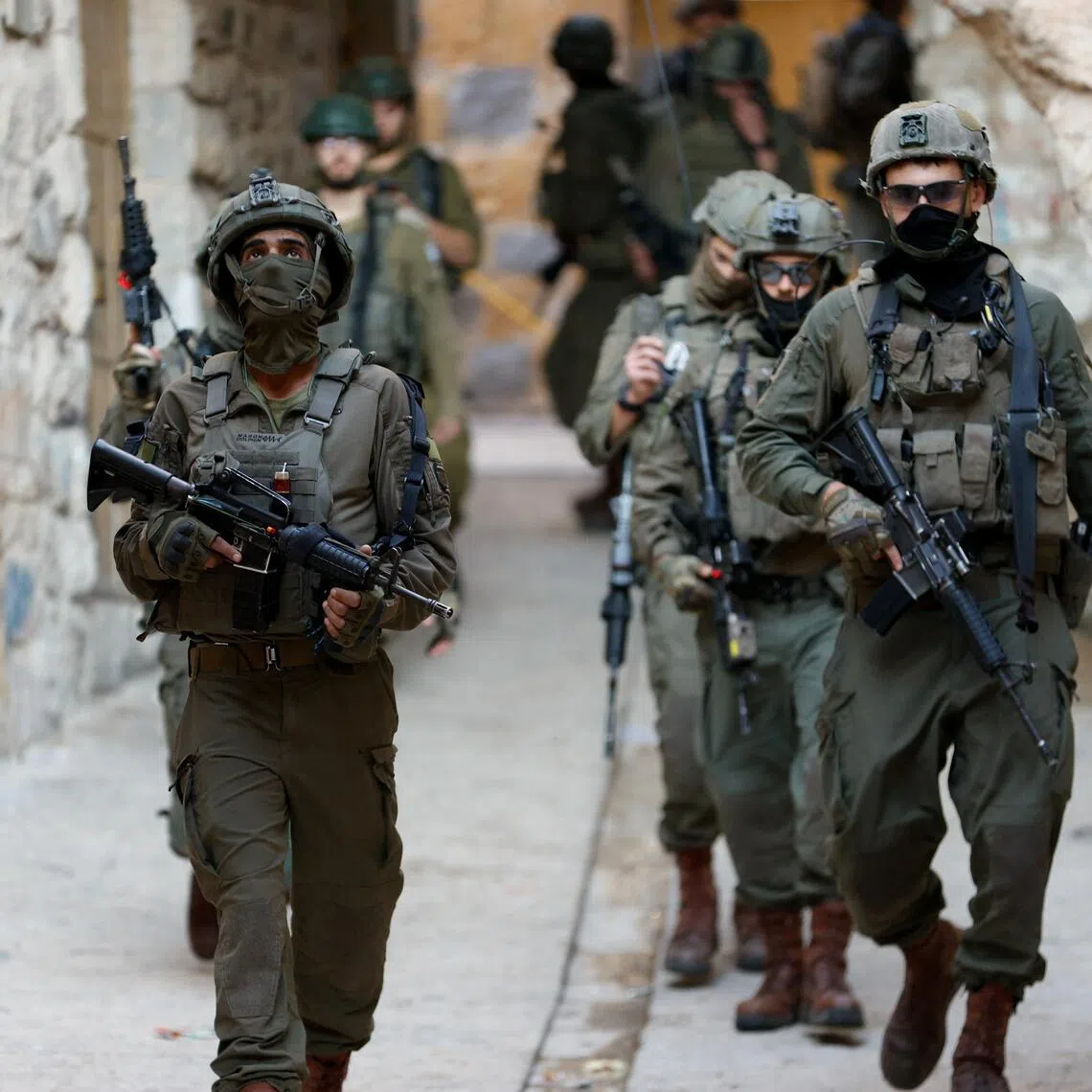 Israeli soldiers during a weekly settlers’ tour on Oct 20 in Hebro,  in the Israel-occupied West Bank.